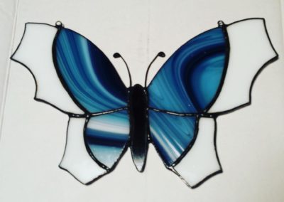 blauwe vlinder uit glas
